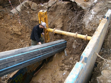 Installation of communication lines using trenchless technology of laying pipes
